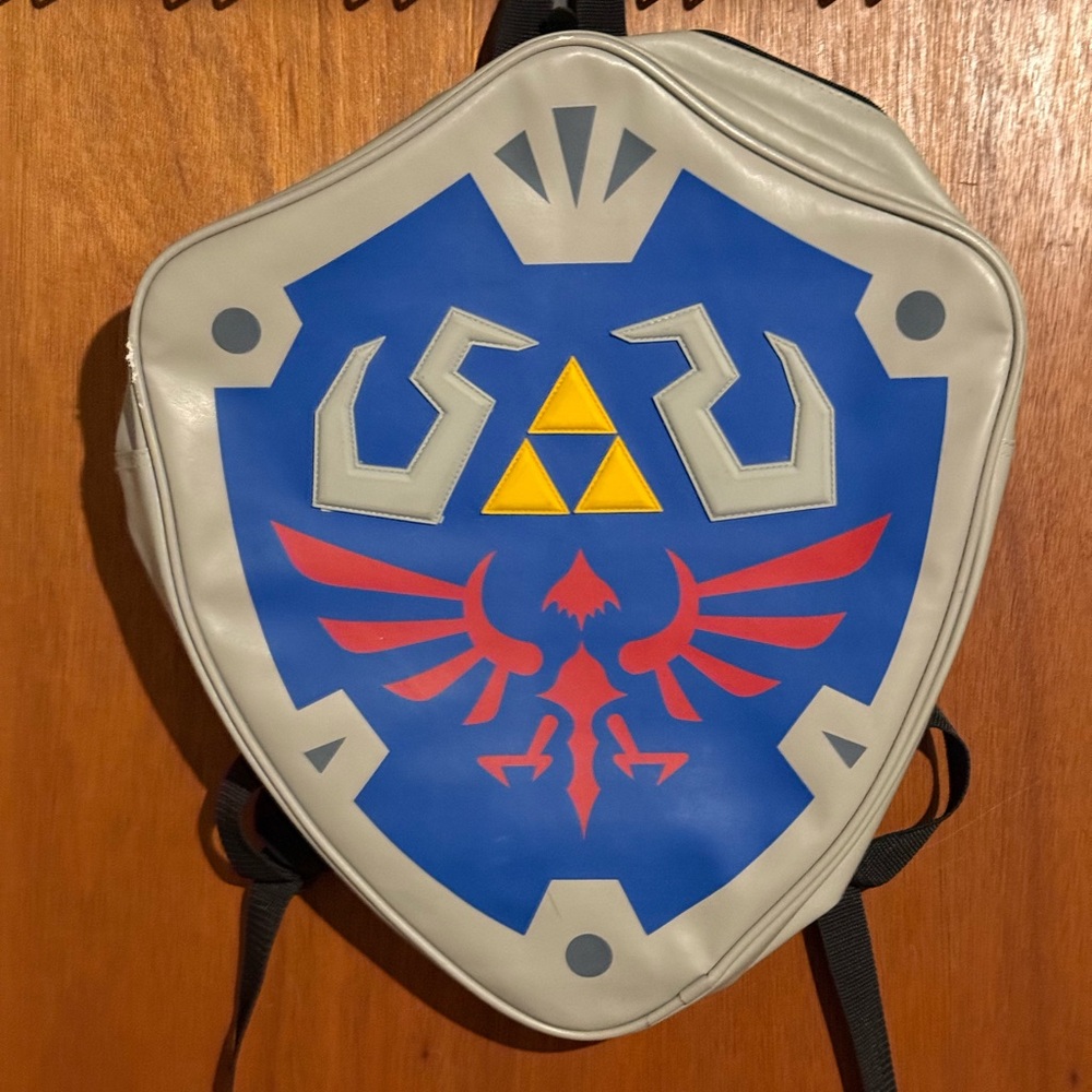 The Legend Of Zelda The Skyward Sword Blue and Gray Shield Backpack for Kids